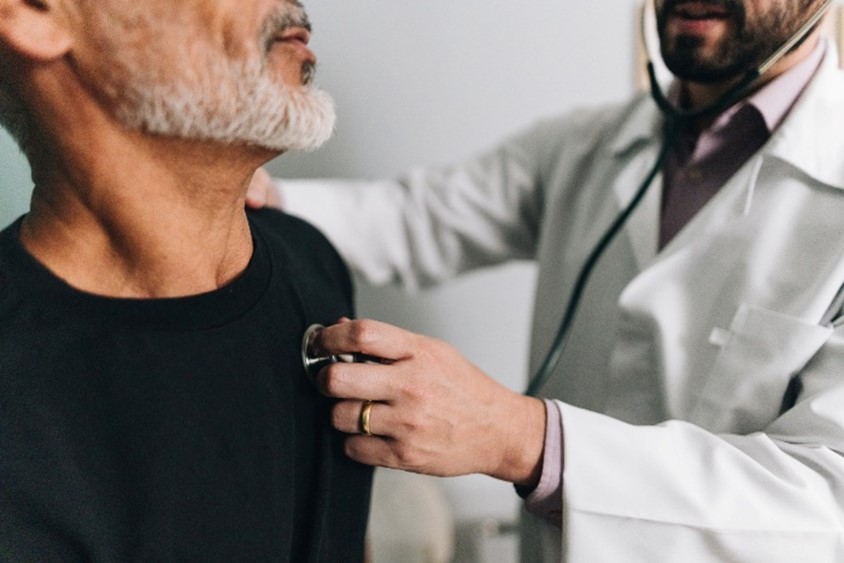 Close-up of a doctor examining a patient in a hospital