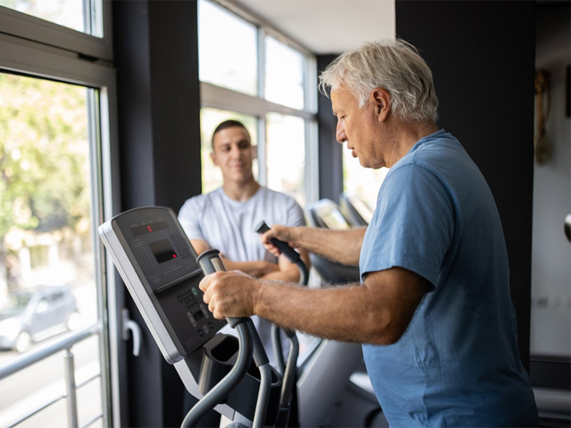 Person exercising on treadmill in gym